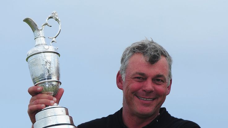 SANDWICH, ENGLAND - JULY 17:  Darren Clarke of Northern Ireland poses with the Claret Jug following his victory at the end of the final round of The 140th 