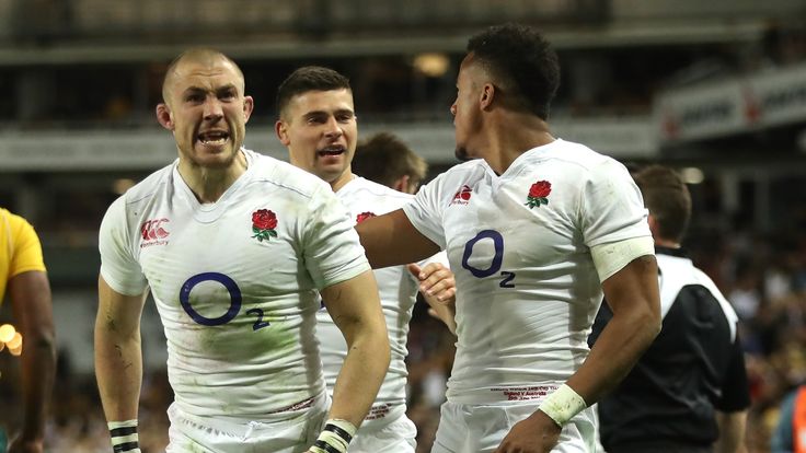 SYDNEY, AUSTRALIA - JUNE 25:  Mike Brown of England celebrates with team mate Anthony Watson (R) and Ben Youngs after scoring their second try during the I