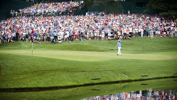 Rory McIlroy of Northern Ireland walks onto the eightenth green before winning the 111th US Open by eight strokes over Jason Day with a record 268 at Congr