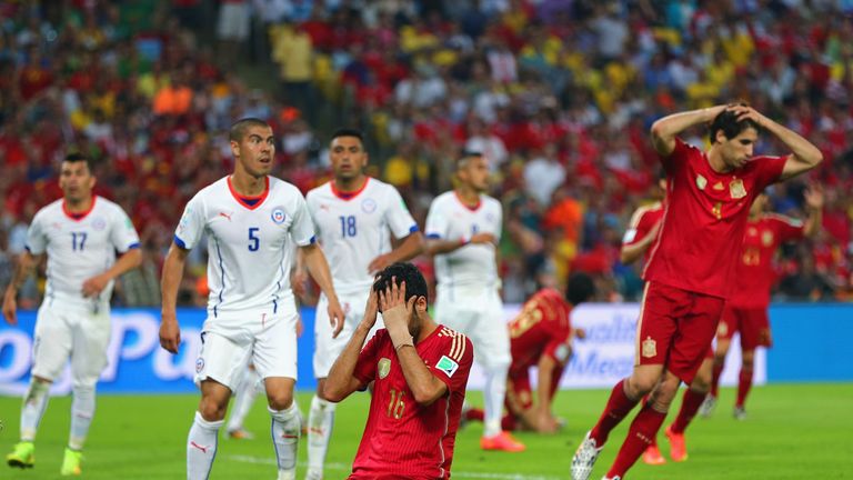 Sergio Busquets of Spain reacts after a missed chance during the 2014 FIFA World Cup Brazil Group B match between Spain