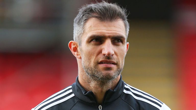 Aaron Hughes is hoping to win his 100th cap for Northern Ireland in Slovakia
