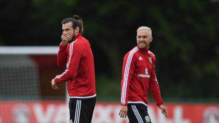 Wales players Aaron Ramsey and Gareth Bale share a joke