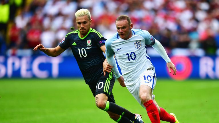 LENS, FRANCE - JUNE 16:  Wayne Rooney of England and Aaron Ramsey of Wales compete for the ball during the UEFA EURO 2016 Group B match between England and