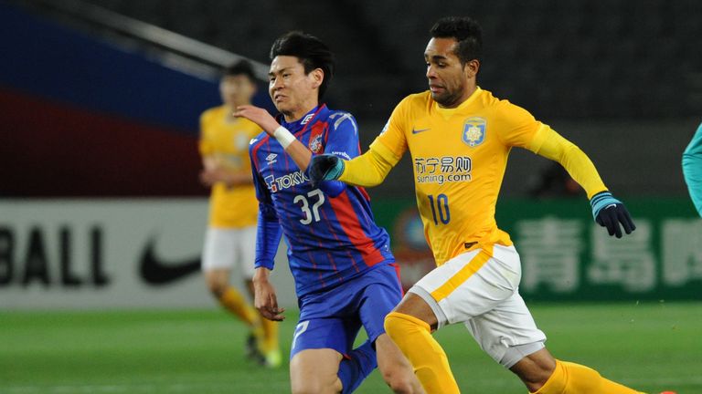 Alex Teixeira (right) signed for Jiangsu Suning after opting against moving to Liverpool