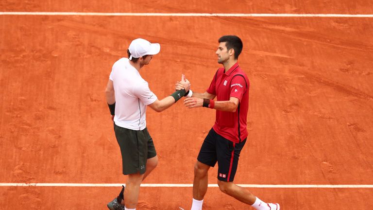 Murray congratulates Djokovic at the end of the three-hour final