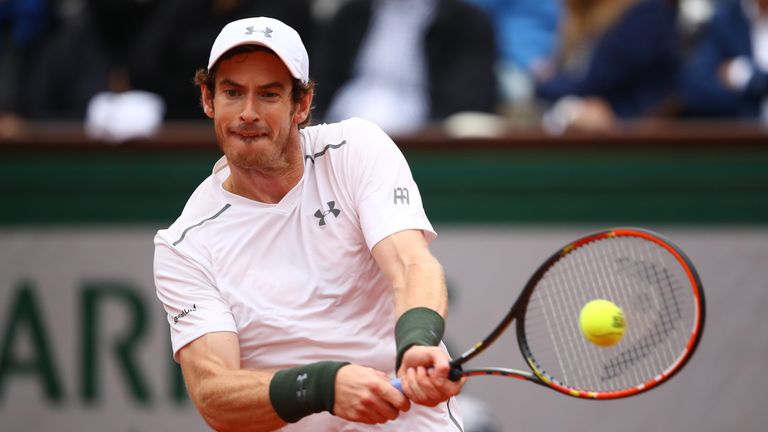 Andy Murray hits a backhand during his quarter final match against Richard Gasquet