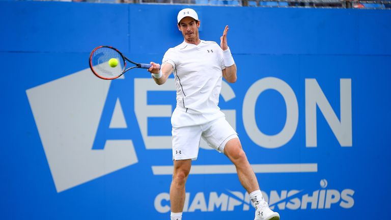 LONDON, ENGLAND - JUNE 14:  Andy Murray of Great Britain plays a forehand during his first round match against Nicolas Mahut of France during day two of th
