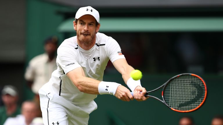 LONDON, ENGLAND - JUNE 28:  Andy Murray of Great Britain plays a backhand during the Men's Singles first round match against Liam Broady of Great Britain o