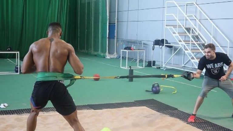 Anthony Joshua trains in a sandpit (courtesy of Instagram)