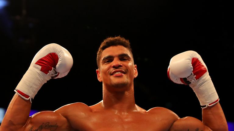 Anthony Ogogo celebrates victory over Frane Radnic of Croatia 