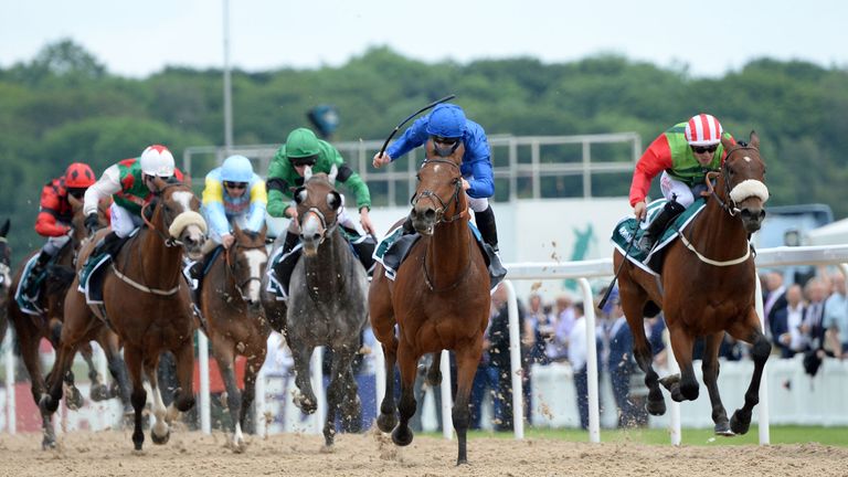 Antiquarium ridden by James McDonald (centre, blue silks) beats Seamour ridden by Ben Curtis (right) to win the John Smith's Northumberland Plate during Jo
