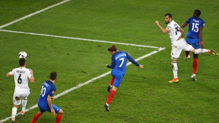 Antoine Griezmann of France scores his side's first goal 