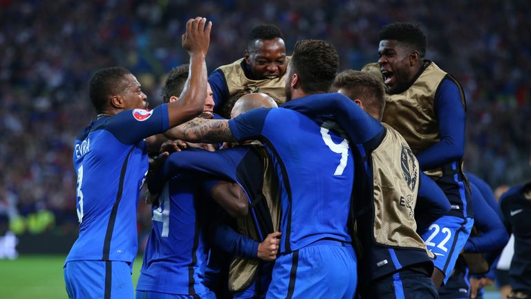 The France squad celebrate with Antoine Griezmann after he scored his sides first goal against Albania