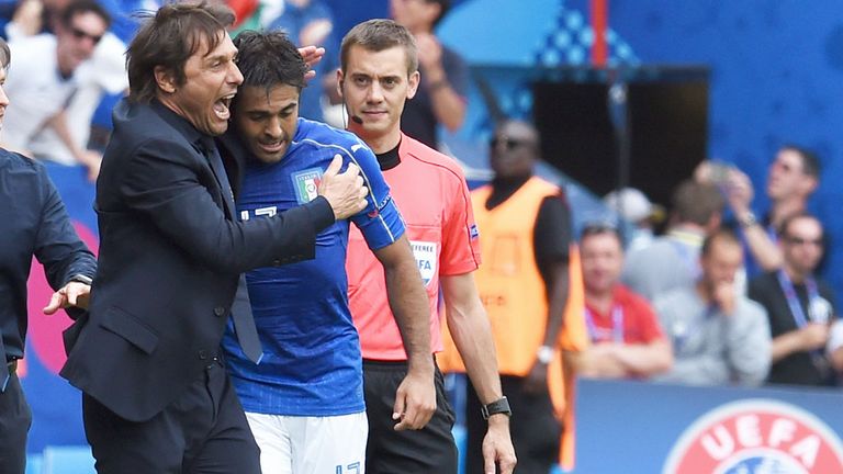 Italy coach Antonio Conte celebrates with Eder after his goal against Sweden