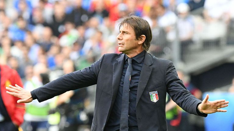 Italy's coach Antonio Conte reacts during the Euro 2016 round of 16 football match between Italy and Spain at the Stade de France stadium in Saint-Denis