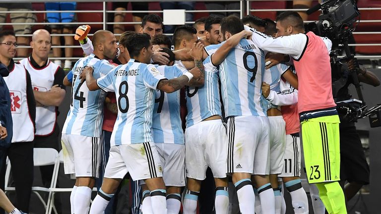 Argentina players celebrate Angel Di Maria's goal