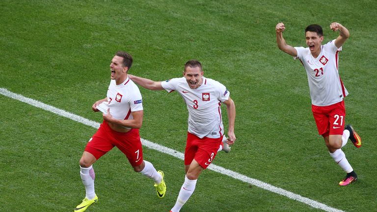 Arkadiusz Milik of Poland celebrates 