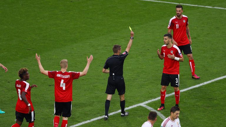 Austria's task got harder when Aleksandar Dragovic was shown a second yellow card and sent off