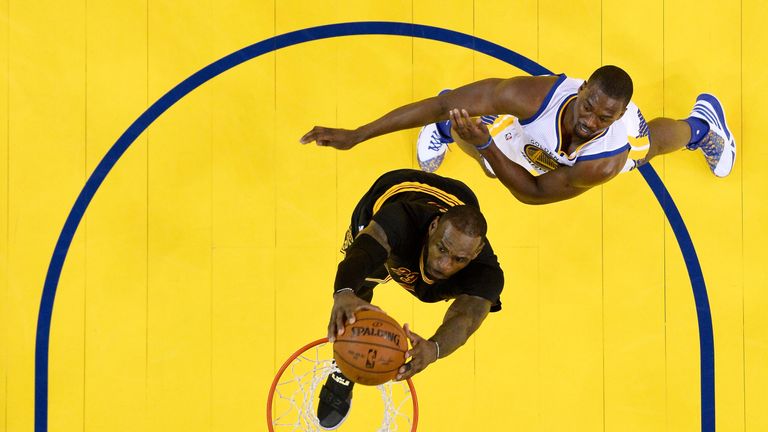 LeBron James dunks the ball against the Golden State Warriors