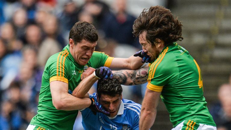 Bernard Brogan of Dublin in action against Padraic Harnan, left, and Mickey Burke of Meath during the Semi-Final match between Dublin and Meath