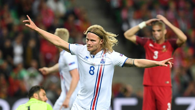 Iceland's midfielder Birkir Bjarnason celebrates the team's first goal