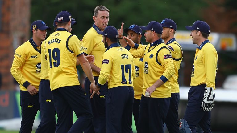 DERBY, ENGLAND - JUNE 17:  Ian Bell of Warwickshire is congratulated on catching Chesney Hughes of Derbyshire during the NatWest T20 Blast match between De