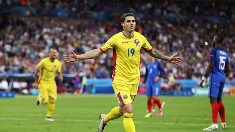 Romania's Bogdan Stancu celebrates scoring his side's first goal from the penalty spot 