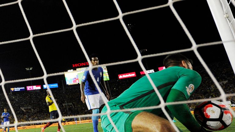 PASADENA, CA - JUNE 4: The soccer ball bounces off the shoulder of goalkeeper Alisson Becker #1 of Brazil and bounces into the goal during the second half 