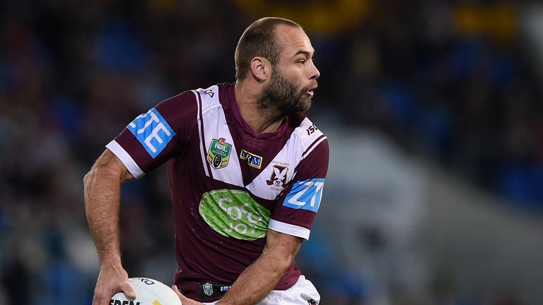 GOLD COAST, AUSTRALIA - JUNE 20: Brett Stewart of the Sea Eagles passes the ball during the round 15 NRL match between the Gold Coast Titans and the Manly 