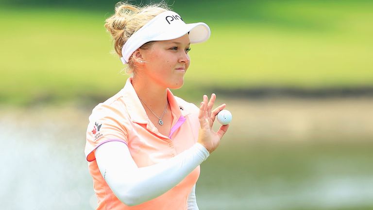 Brooke Henderson shares the lead