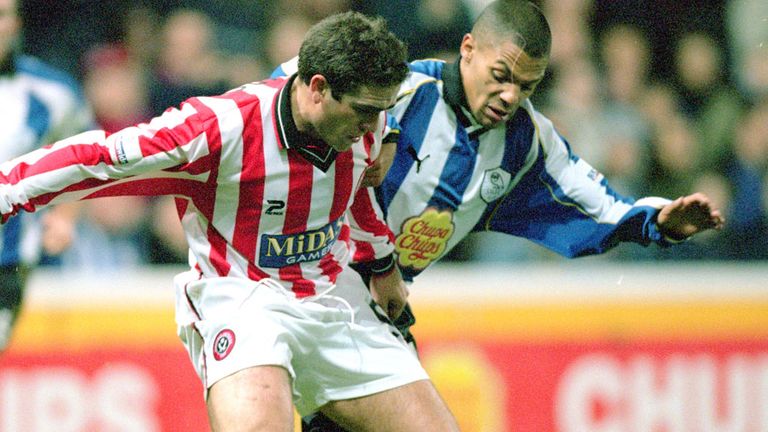 Bruno Ribeiro (L) in action durring a Sheffield derby match