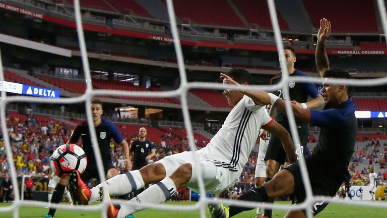 Carlos Bacca of Colombia scores a first half goal