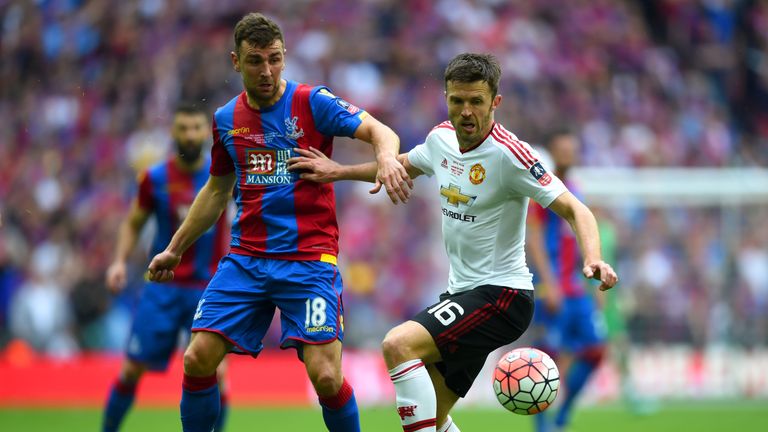 James McArthur of Crystal Palace and Michael Carrick of Manchester United battle for the ball during The Emirates FA Cup Final