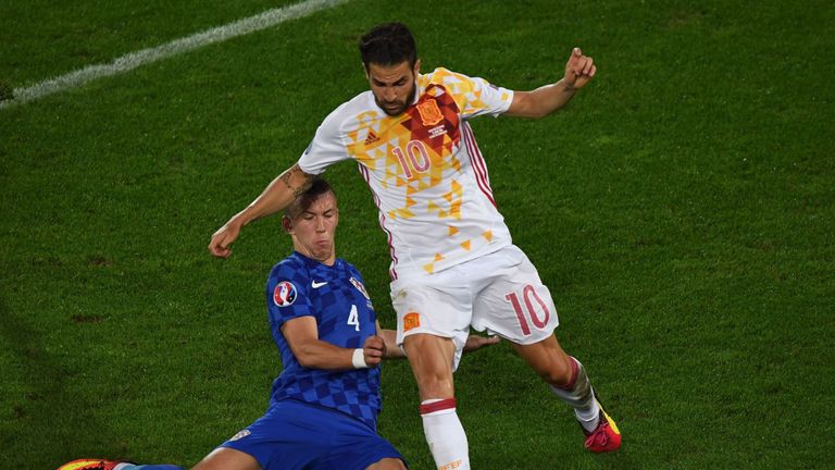 Will Cesc Fabregas (R) start against Italy on Monday?