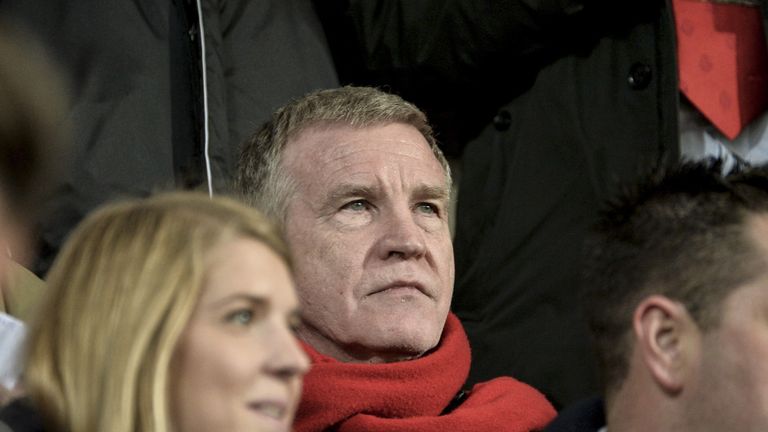 Belgian billionaire businessman and Standard's owner Roland Duchatelet watches the UEFA Europa League football match Standard Liege vs Sevilla on October 2