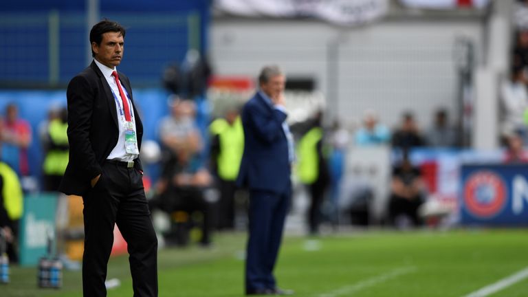 Wales boss Chris Coleman looks on next to Roy Hodgson