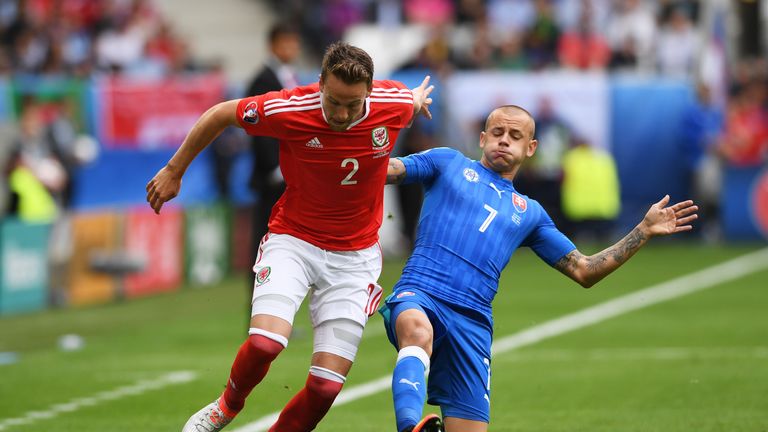 BORDEAUX, FRANCE - JUNE 11:  Chris Gunter of Wales is tackled by Vladimir Weiss of Slovakia during the UEFA EURO 2016 Group B match between Wales and Slova