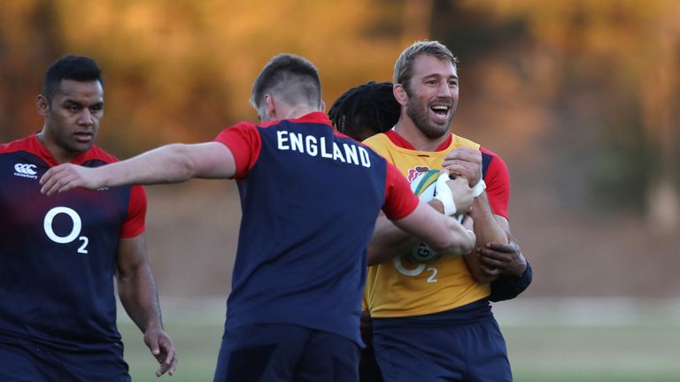 Chris Robshaw is held by Owen Farrell during the England training session held at Scotch College