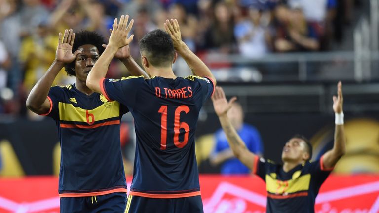 Colombia's players celebrate after defeating the USA during the Copa America Centenario football tournament match in Santa Clara, California, United States