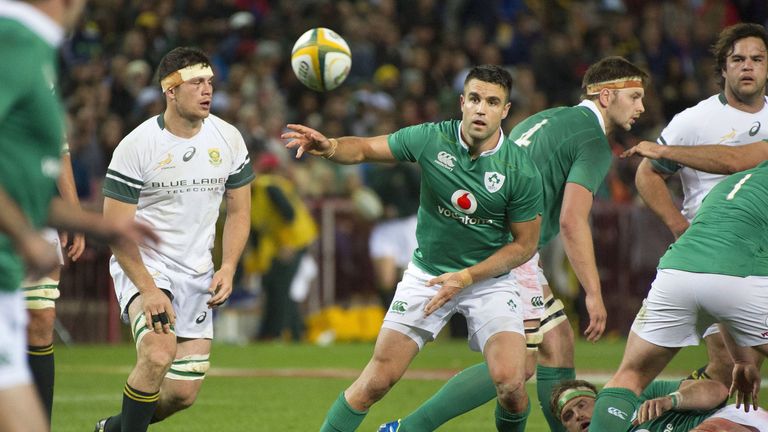 Ireland's scum-half Connor Murray (centre) passes the ball out during the Test between South Africa and Ireland on June 11 2016