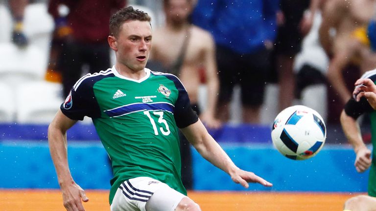 Northern Ireland midfielder Corry Evans challenges for the ball against Ukraine