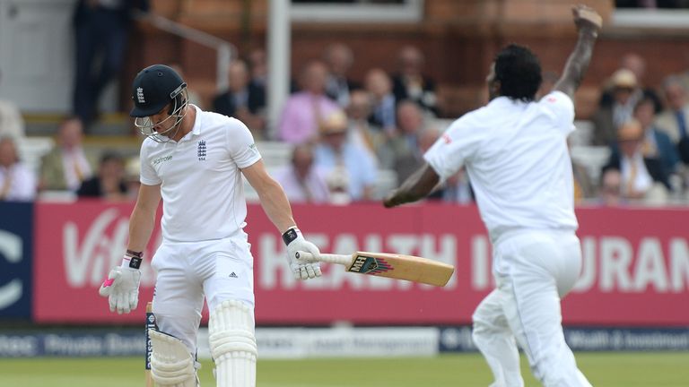 England's Nick Compton (left) reacts after Sri Lanka's Shaminda Eranga (right) takes his wicket