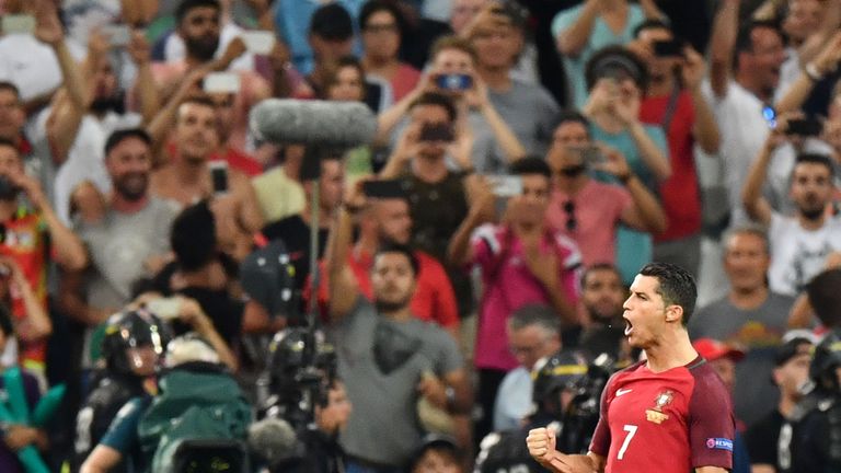 Portugal's forward Cristiano Ronaldo reacts after scoring  the first in a penalty shoot-out
