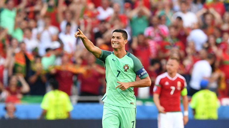 Portugal's forward Cristiano Ronaldo celebrates after scoring a goal during the Euro 2016 group F football match between Hungary and Portugal at the Parc O