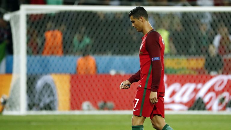 Portugal's forward Cristiano Ronaldo walks over the pitch at the end of the Euro 2016 group F football match between Portugal and Iceland