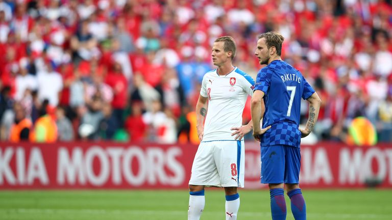 Croatia's Ivan Rakitic (right) and David Limbersky of Czech Republic (left) watch events unfold at the Stade Geoffroy-Guichard 