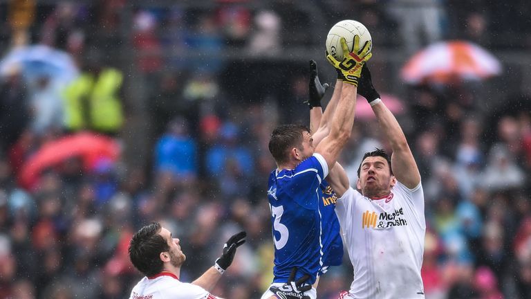 David Givney of Cavan in action against Mattie Donnelly of Tyrone