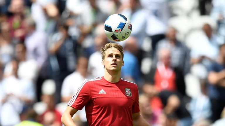 Wales' midfielder David Edwards warms up ahead the Euro 2016 group B football match between England and Wales at the Bollaert-Delelis stadium in Lens on Ju