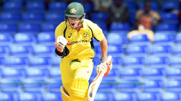 Australia batsman David Warner celebrates his century in St. Kitts