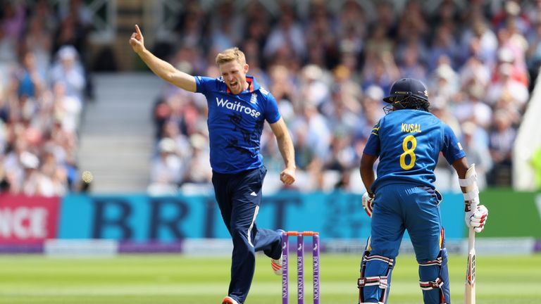 David Willey of England celebrates the wicket of Kusal Perera of Sri Lanka caught by Jaosn Roy of England during of the 1st ODI